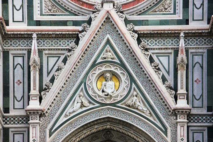 A Figure Of Christ Bound On The Facade Of The Florence Cathedral In Florence Italy