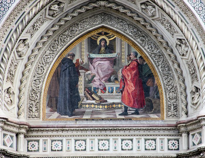 A Gothic Revival Showing Charity In A Mosaic On The Facade Of The Florence Cathedral In Florence Italy