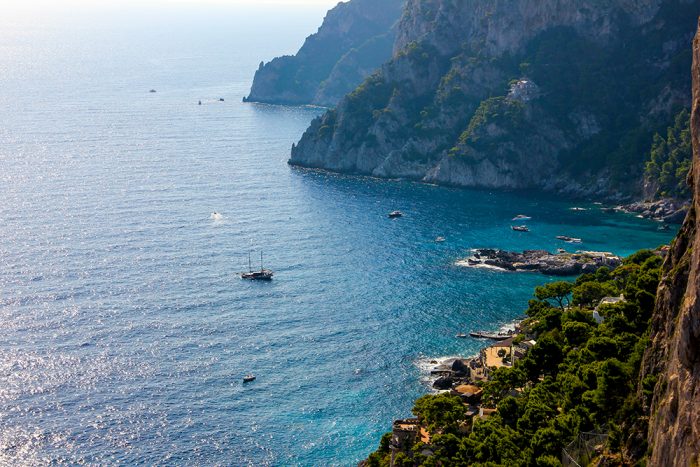 A Coastal View Of The Blue Waters Off The Coast Of The Island Of Capri In Italy