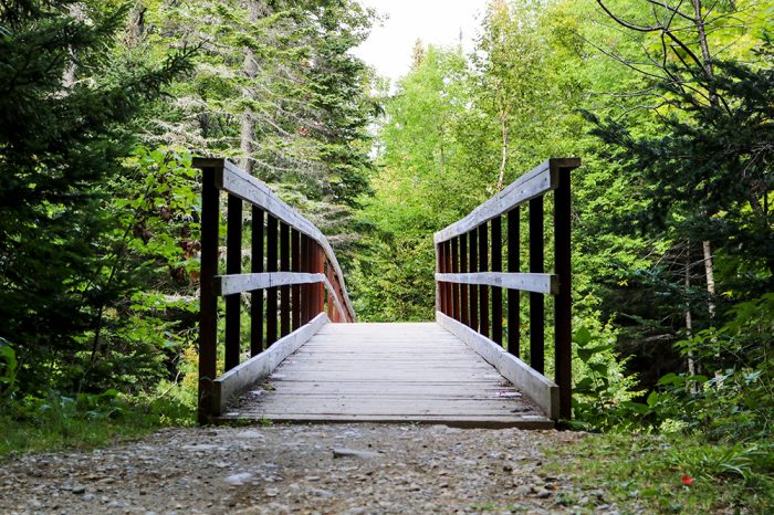 Narrow Gauge Trail Bridge Entrance Over Carrabassett River In Carrabassett Valley Maine