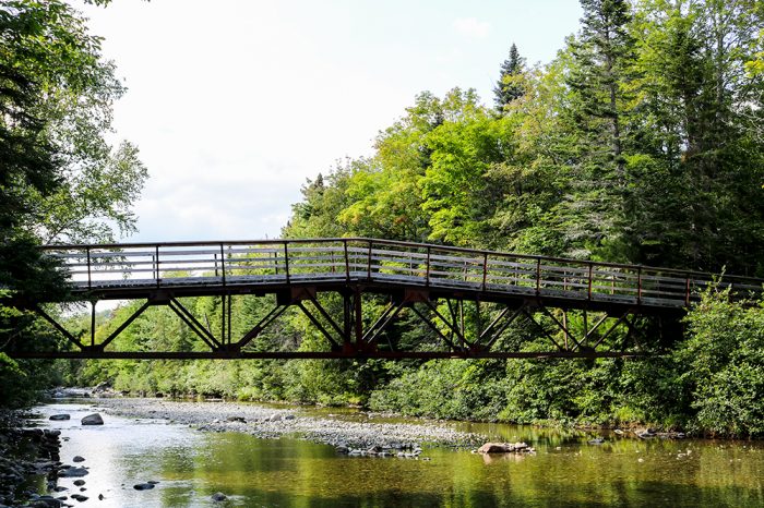 Narrow Gauge Trail Bridge Over Carrabassett River In Western Maine Near Sugarloaf In Carrabbassett Valley
