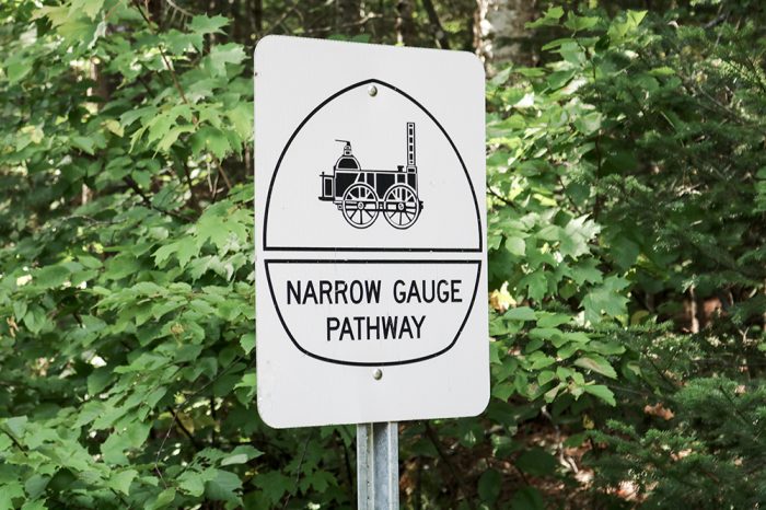 A Sign On The Narrow Gauge Pathway In Western Maine In Carrabassett Valley 