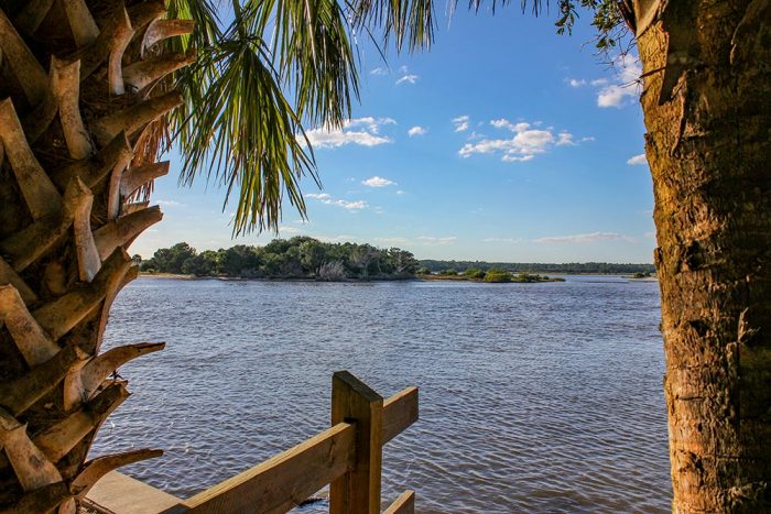 A View Of The Matanzas River Framed By Palm Trees In Washington Oaks Gardens Oaks In Florida