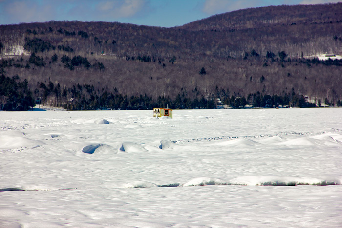 Ice Fishing Shack On Clearwater Lake In Maine