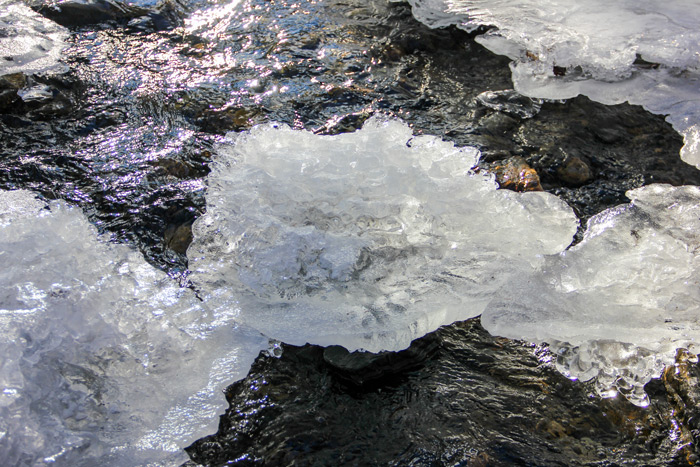 Ice Formations In A Stream Bed During The Winter