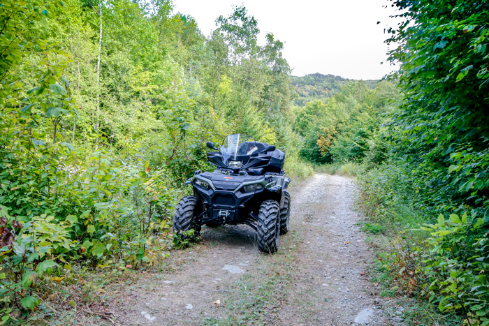 Polaris ATV Parked On Poplar Trail