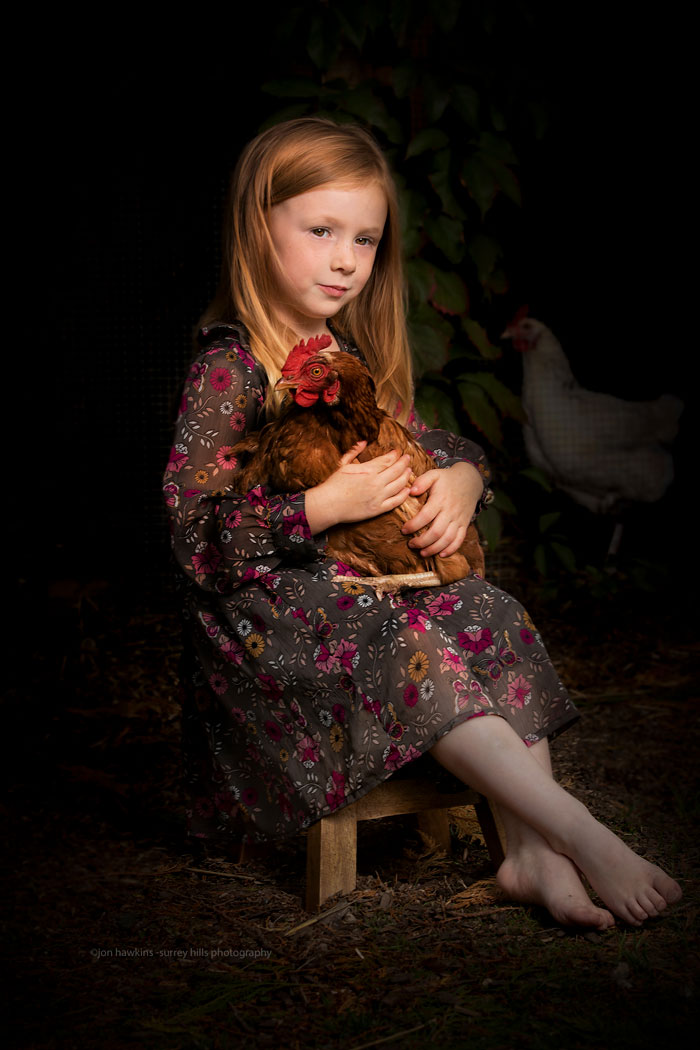 Young Girl With Chicken