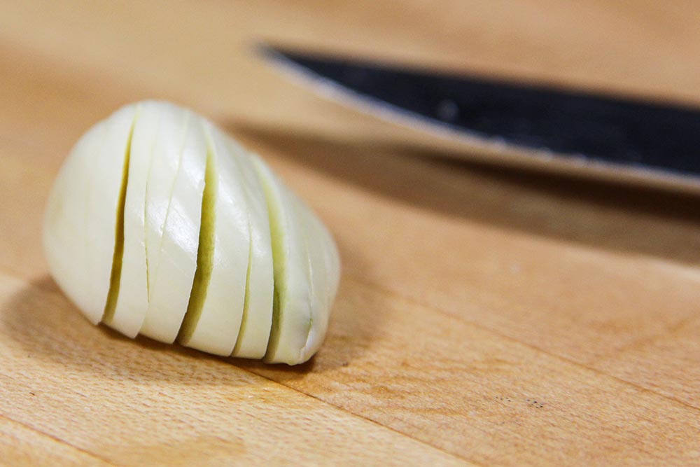 Cut Garlic Clove With Paring Knife