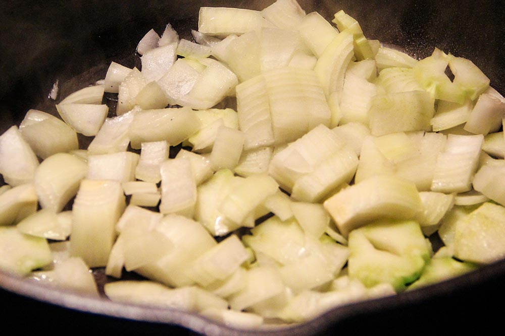 Sauteing Onion & Broccoli Stems in Dutch Oven