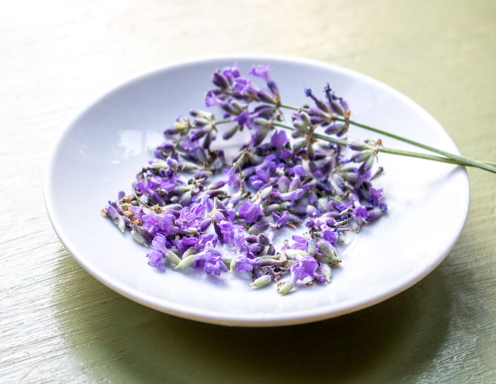 A Plate Of Lavender Buds And Flowers